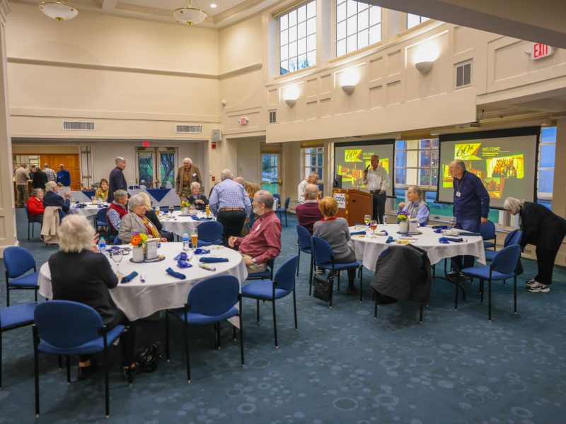 Alumni who were residents of the Allen House gathered at tables in the Great Hall to celebrate the Allen House 60th reunion