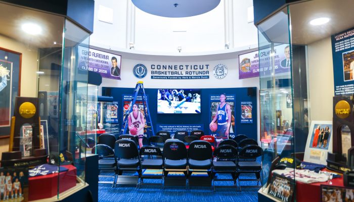Chairs lined up facing a television in the Husky Heritage Museum
