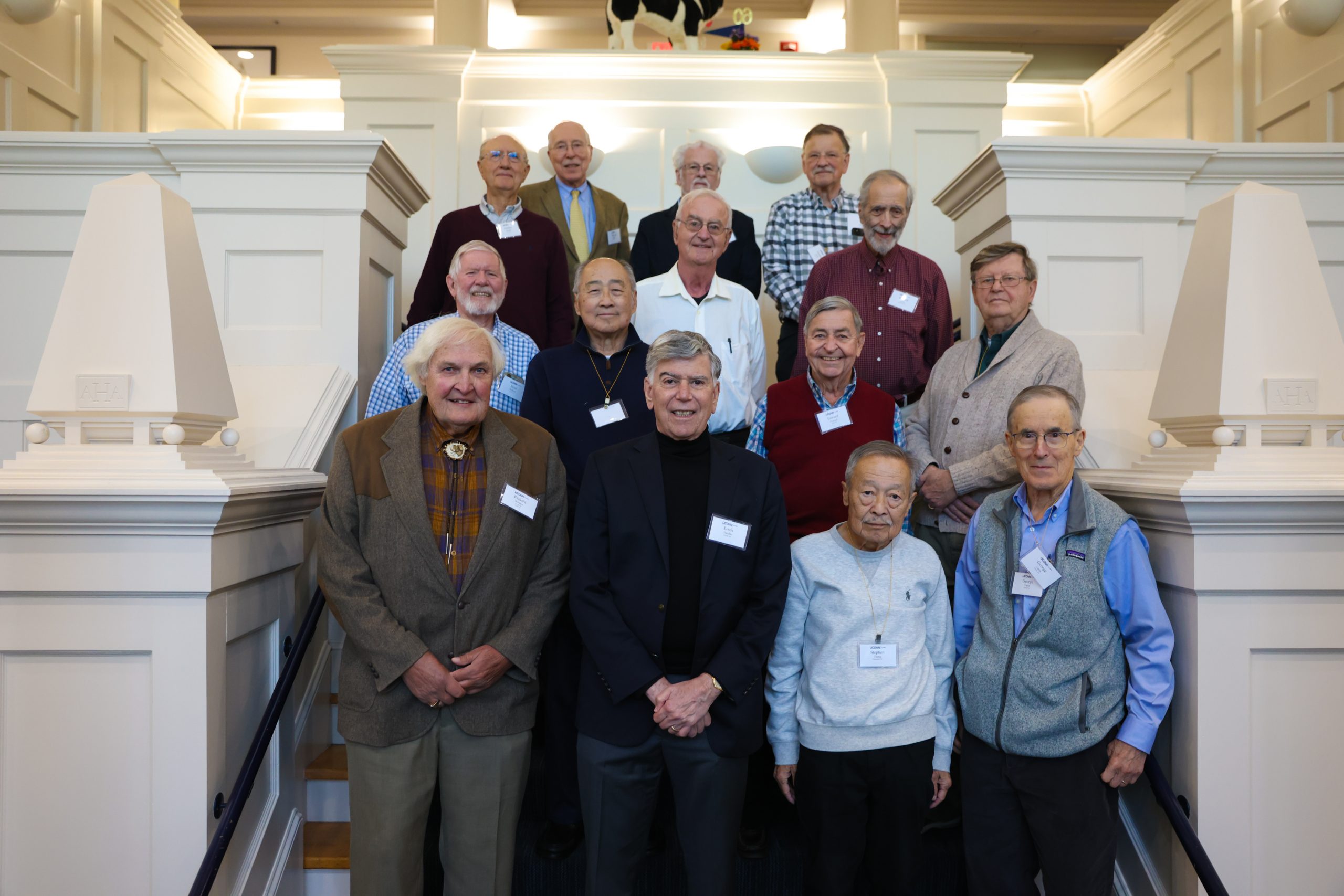 Allen House members posing for a photo at the Great Hall in the Alumni Center