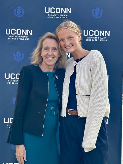 Dean Dickson and Makenna Graves at the beam signing ceremony on October 27, 2025.
