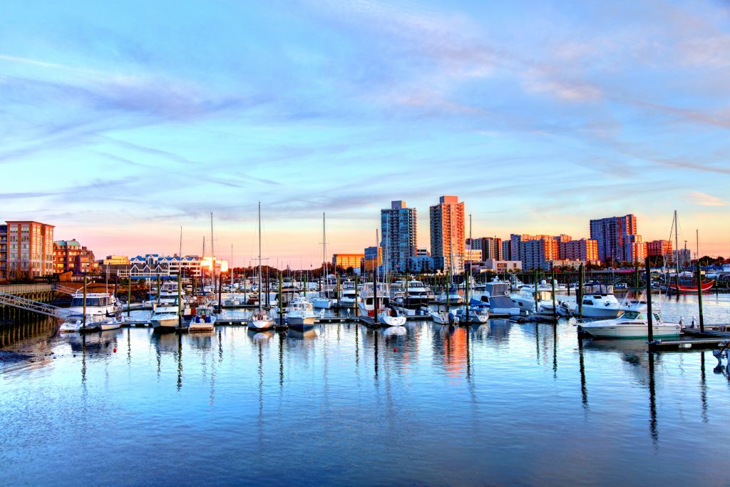 The harbor during sunset in Stamford with boats docked