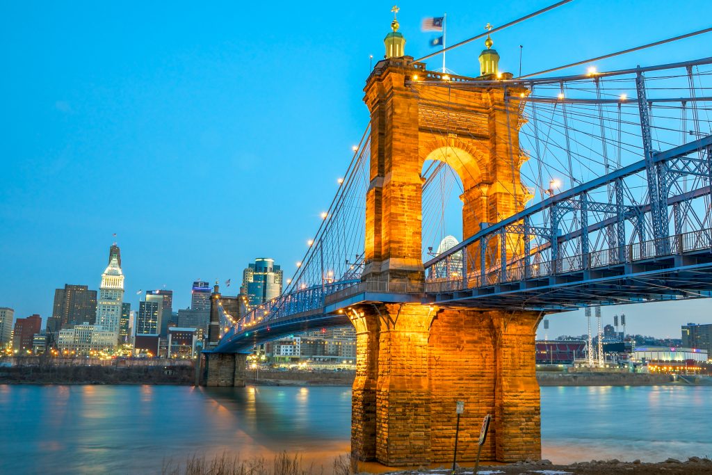 Dawn over Cincinnati skyline and the Roebling bridge over the River Ohio