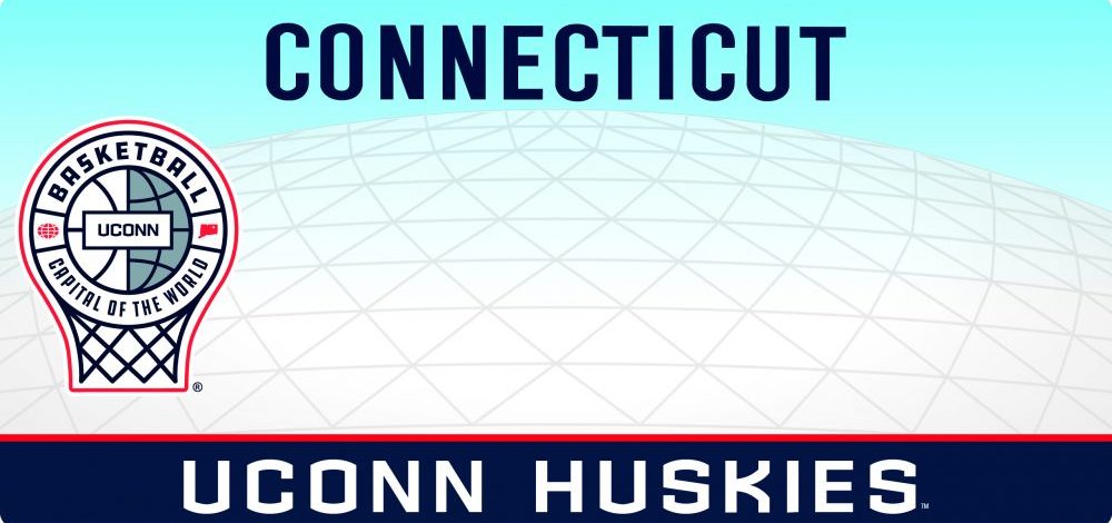 UConn-CTLicense-Plate-BBall-Capital Connecticut license plate featuring a light blue gradient sky and a large domed basketball arena in the background. On the left is a stylized basketball‑themed UConn logo shaped like a hoop and backboard, with the text ‘Basketball Capital of the World.’ At the top, ‘CONNECTICUT’ appears in dark blue. A navy band along the bottom reads ‘UCONN HUSKIES’ in white with a thin red line above it.