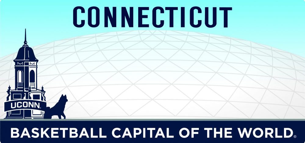 UConn-CTLicense-Plate-WilburCross-Statue Graphic design of a Connecticut license plate featuring a light blue gradient sky, the word ‘CONNECTICUT’ in bold letters at the top, a large domed basketball arena in the background, and an illustration of the UConn Wilbur Cross Building with a husky dog silhouette in the foreground. A dark blue banner at the bottom reads ‘BASKETBALL CAPITAL OF THE WORLD.’